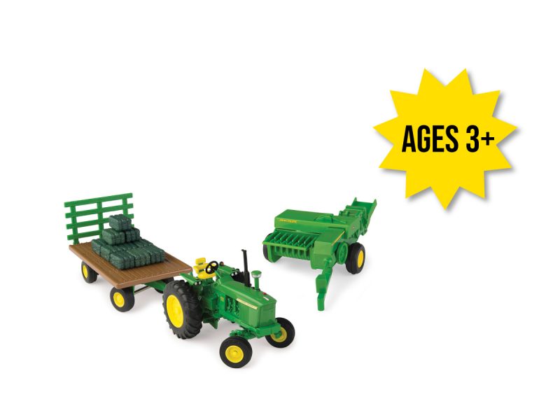 Image of the 1/32 scale John Deere square bale haying toy set featuring 4020 tractor, hay wagon, square baler and hay bales.