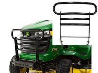 Image of the John Deere Brush Guard Kit for Lawn tractors on the front of a riding lawn tractor.