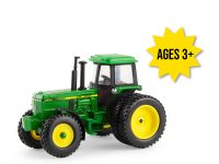 Image of the 1/64 scale John Deere 4850 Replica play toy tractor featuring the FFA emblem on the hood.