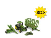 Image of the 1/64 scale John Deere Replica Play 6210 tractor with square baler and wagon toy haying set.