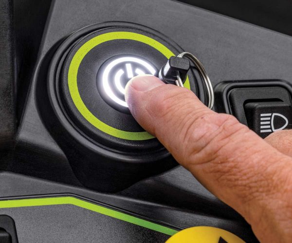 Image of the power button on the John Deere Z370R Electric ZTrak Zero Turn lawn mower.