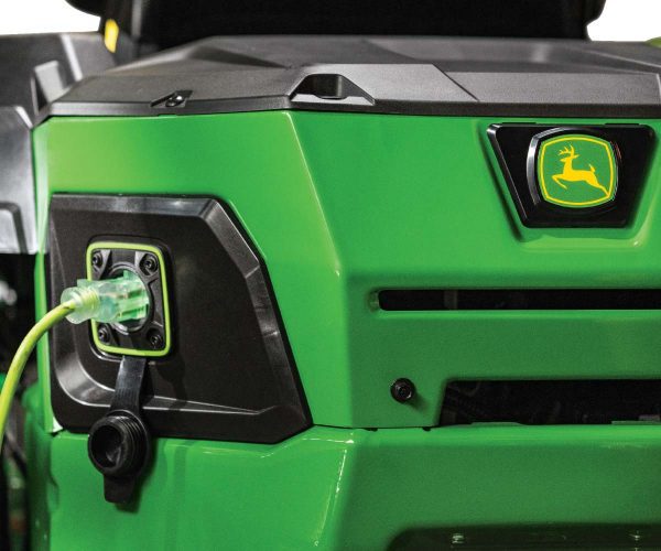 Image of the John Deere Z370R Electric ZTrak Zero Turn lawn mower charging.