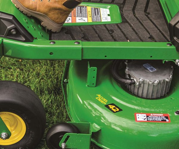 Image of the feet area and mower deck on the John Deere Z370R Electric ZTrak Zero Turn lawn mower.